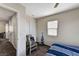 Bedroom features a large closet and natural light from the window at 5228 Fire Night Ave, Las Vegas, NV 89122