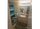 Well-lit bathroom with neutral tones, a vanity, and coordinated bath accessories at 555 E Silverado Ranch Blvd # 2028, Las Vegas, NV 89183