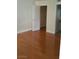 View of bedroom with wood floors and closet at 555 E Silverado Ranch Blvd # 2028, Las Vegas, NV 89183
