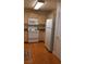 Functional kitchen featuring basic appliances, ample cabinetry, and laminate countertops at 555 E Silverado Ranch Blvd # 2028, Las Vegas, NV 89183