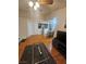 Open-concept living area featuring hard wood flooring and a view to the kitchen at 555 E Silverado Ranch Blvd # 2028, Las Vegas, NV 89183