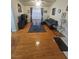 Cozy living room with gray sofa and hardwood floors, perfect for relaxing and entertaining at 555 E Silverado Ranch Blvd # 2028, Las Vegas, NV 89183