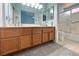 Bathroom featuring a double sink vanity with a shower and toilet at 5638 Morning Song Cir, North Las Vegas, NV 89031