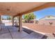 Covered patio extends to a low maintenance backyard, perfect for relaxing and entertaining at 5808 Spinnaker Reach Ave, Las Vegas, NV 89130