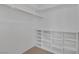 Well-organized walk-in closet with built-in shelving for optimal storage at 5808 Spinnaker Reach Ave, Las Vegas, NV 89130