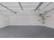 Spacious garage with ample room for parking and storage at 5808 Spinnaker Reach Ave, Las Vegas, NV 89130