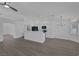 Spacious all white kitchen with stainless steel appliances and stone countertops at 5808 Spinnaker Reach Ave, Las Vegas, NV 89130