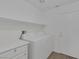 Clean laundry room with modern appliances and laminate countertops at 5808 Spinnaker Reach Ave, Las Vegas, NV 89130