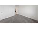 Neutral bedroom featuring carpet, white walls, and closet at 595 Beverly Pine Pl, Henderson, NV 89011