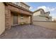 Private courtyard with a stone pillar-supported roof and seating area at 595 Beverly Pine Pl, Henderson, NV 89011
