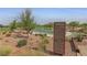 A view of a playground with a variety of equipment for children in a natural setting at 595 Beverly Pine Pl, Henderson, NV 89011