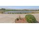 Scenic view of a tranquil pond, enhancing the community's peaceful and attractive ambiance at 595 Beverly Pine Pl, Henderson, NV 89011