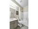 Bathroom features a shower and bath, vanity, and updated fixtures at 7141 Groveton Ct, Las Vegas, NV 89131