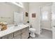 Bathroom featuring vanity with a sink, toilet, and nice decor at 7141 Groveton Ct, Las Vegas, NV 89131