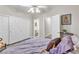 Bright bedroom boasts a ceiling fan, closet, with ensuite bathroom at 7141 Groveton Ct, Las Vegas, NV 89131