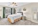 Bedroom with shuttered window, ceiling fan and comfortable bed at 7141 Groveton Ct, Las Vegas, NV 89131