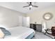 Comfortable bedroom with fan, storage, and an ensuite bathroom at 7141 Groveton Ct, Las Vegas, NV 89131