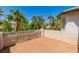 Spacious outdoor deck with palm tree views, offering a relaxing and private space for outdoor enjoyment at 7141 Groveton Ct, Las Vegas, NV 89131