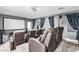 Home theater featuring reclining seats, a projector screen, and surround sound for a cinematic experience at 7141 Groveton Ct, Las Vegas, NV 89131