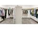 Spacious walk-in closet with custom shelving and ample storage for organizing clothes and accessories at 7141 Groveton Ct, Las Vegas, NV 89131