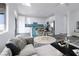 Open-concept living space with a modern kitchen and stylish dining area at 760 Camino La Paz, Henderson, NV 89012