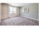 Clean and carpeted bedroom with nice natural light, a neutral palette, and modern artwork at 7665 Serenity Bay Ln # Lot 58, North Las Vegas, NV 89084