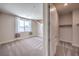 Bedroom featuring neutral paint, carpet and a closet at 7665 Serenity Bay Ln # Lot 58, North Las Vegas, NV 89084