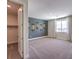 Bedroom featuring carpet, a closet and a window at 7665 Serenity Bay Ln # Lot 58, North Las Vegas, NV 89084