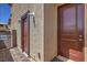 Close up view of the front door and side door, highlighting the exterior paint at 7665 Serenity Bay Ln # Lot 58, North Las Vegas, NV 89084