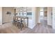 Stylish game room with bar seating, perfect for entertaining guests at 7665 Serenity Bay Ln # Lot 58, North Las Vegas, NV 89084