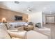 Comfortable living room features a wood accent wall, modern furniture, and ample natural light at 7665 Serenity Bay Ln # Lot 58, North Las Vegas, NV 89084