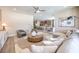 Open-concept living room provides ample seating and a smooth transition to the dining area and kitchen at 7665 Serenity Bay Ln # Lot 58, North Las Vegas, NV 89084