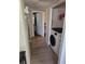 Hallway with a washer and dryer area at 8101 W Flamingo Rd # 2078, Las Vegas, NV 89147
