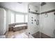 Bathroom featuring both a glass shower and a soaking tub at 8340 W Fisher Ave, Las Vegas, NV 89149