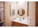 Cozy bathroom with a well-lit vanity area, tiled accents, and a clean, functional design at 8340 W Fisher Ave, Las Vegas, NV 89149