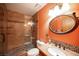 Stylish bathroom features a tiled walk-in shower, granite countertop, and modern fixtures at 8340 W Fisher Ave, Las Vegas, NV 89149