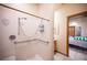 Accessible bathroom with a walk-in shower and safety features, designed for comfort and convenience at 8340 W Fisher Ave, Las Vegas, NV 89149