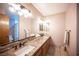 Bathroom vanity with double sinks and a decorative mirror at 8340 W Fisher Ave, Las Vegas, NV 89149