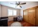 Cozy bedroom with hardwood floors, closet and a window at 8340 W Fisher Ave, Las Vegas, NV 89149