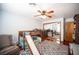 bedroom with a wood bunk bed and slide, and a sliding door closet with mirrored doors at 8340 W Fisher Ave, Las Vegas, NV 89149
