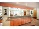 Breakfast bar connects the dining room, living room, and kitchen at 8340 W Fisher Ave, Las Vegas, NV 89149