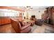 The living room boasts an open layout, breakfast bar, wood burning stove, and tile flooring at 8340 W Fisher Ave, Las Vegas, NV 89149