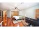 Spacious bedroom with hardwood floors and a ceiling fan for added comfort at 8340 W Fisher Ave, Las Vegas, NV 89149