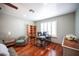Dedicated office space within the main bedroom, featuring built-in shelving and plantation shutters at 8340 W Fisher Ave, Las Vegas, NV 89149