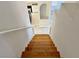 A wooden stairway connects the different levels of the house at 8717 Harvest Valley Ave, Las Vegas, NV 89129