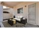 Cozy covered patio with stylish outdoor furniture and decor, perfect for relaxing at 9004 Snowtrack Ave, Las Vegas, NV 89149