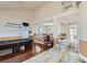 Spacious game room featuring hardwood floors, a pool table, and decorative lighting at 9208 November Breeze St, Las Vegas, NV 89123