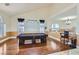 Game room featuring a pool table with hardwood floors, and natural light at 9208 November Breeze St, Las Vegas, NV 89123