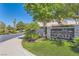 Attractive Crown Pointe community entrance sign, framed by manicured landscaping and a paved street at 9208 November Breeze St, Las Vegas, NV 89123