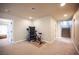 Carpeted basement with a ceiling fan, recessed lighting, and a set of stairs to the upper level at 9450 Niagara Landing St, Las Vegas, NV 89139